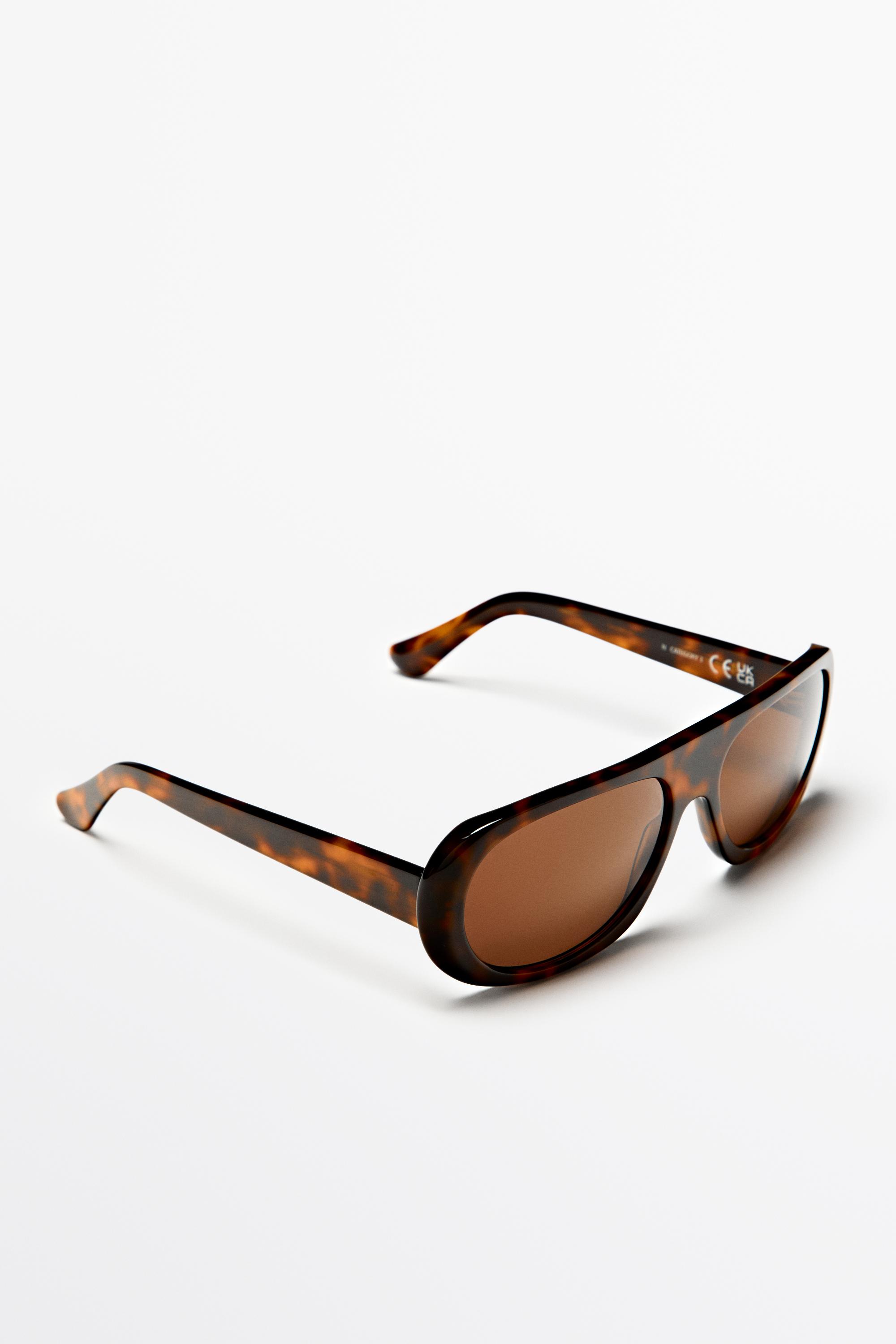 Lunettes de soleil ovales effet écaille
